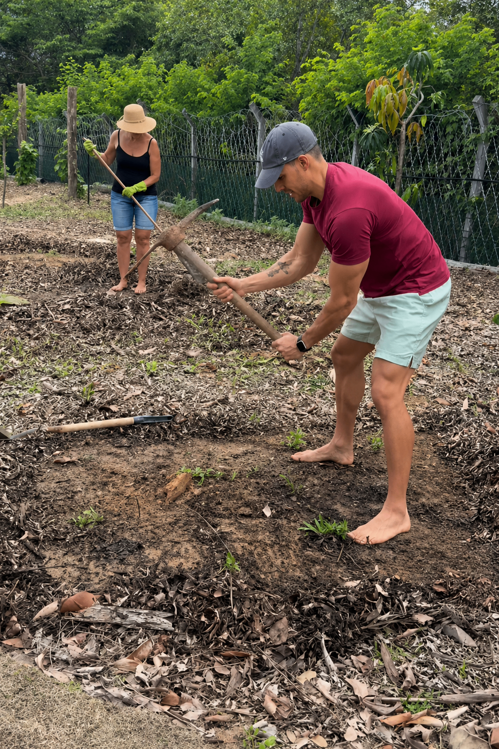 André working the soil in the garden